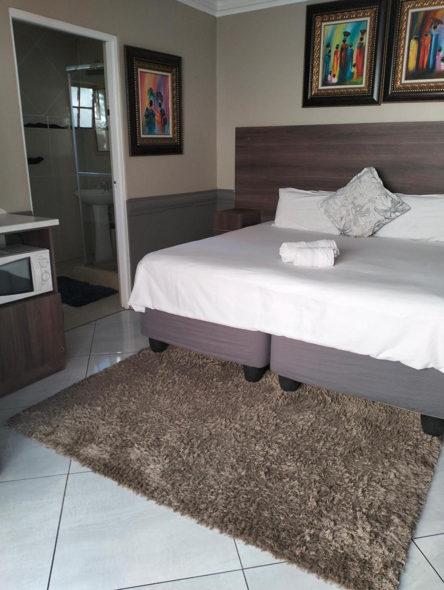 Sunrise Boutique Hotel Witbank Esterno foto
